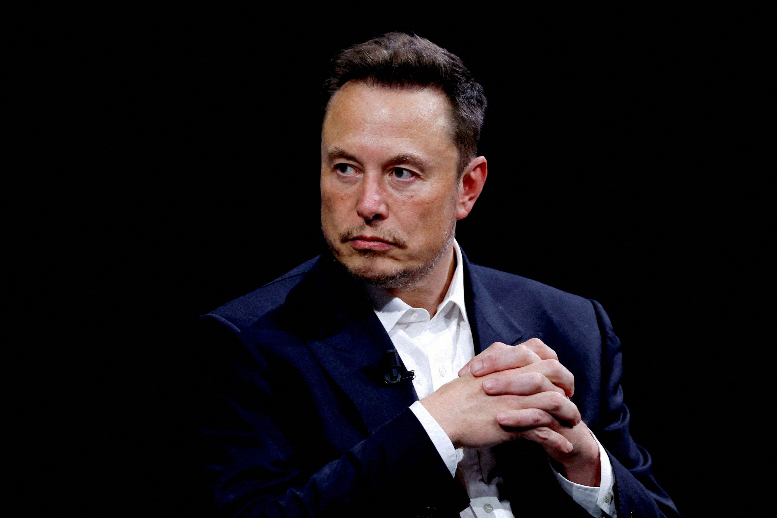 Elon Musk says Tesla will unveil its robotaxi on Aug. 8; shares pop